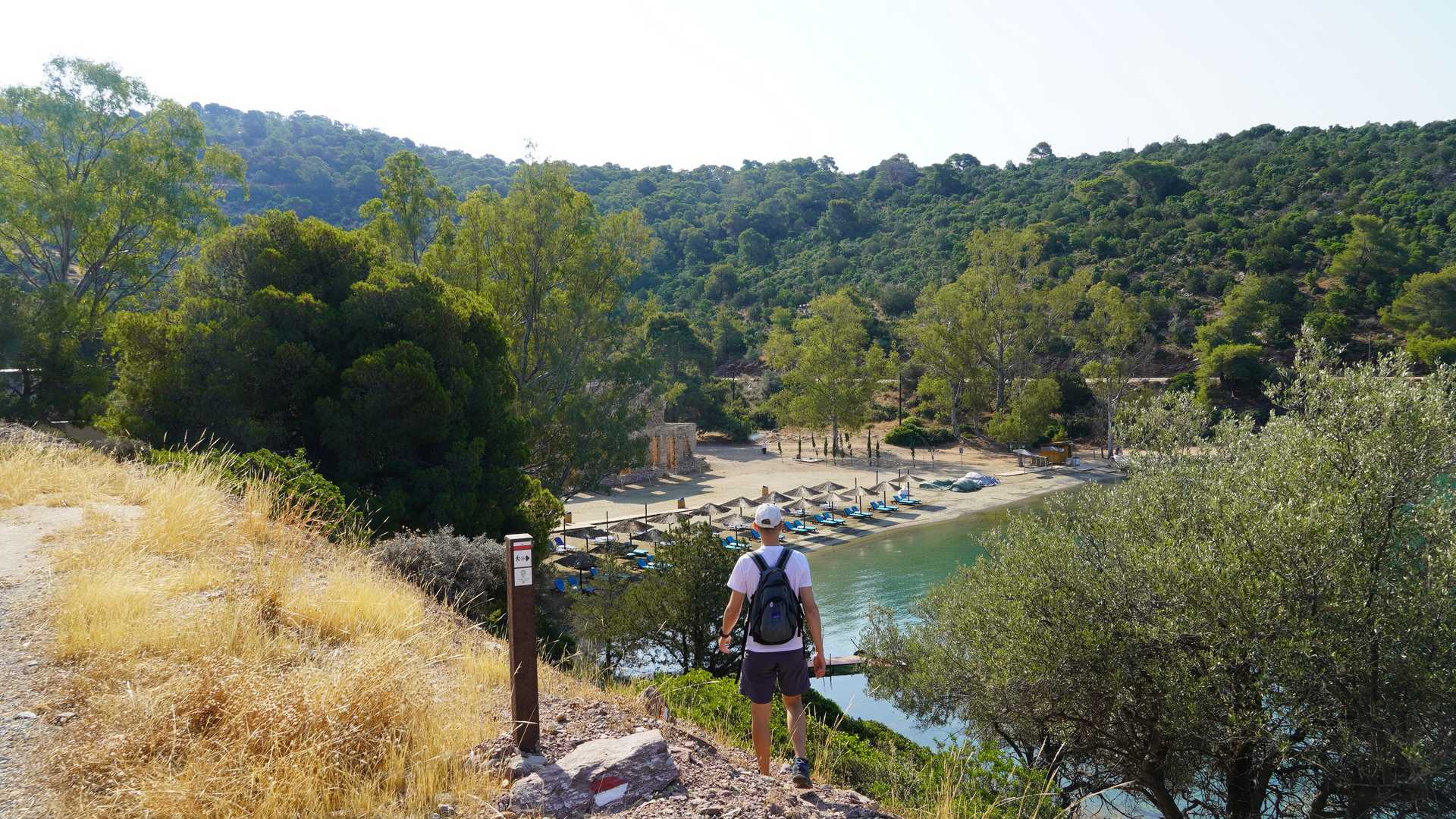 A hiker walking on one of Poros trails